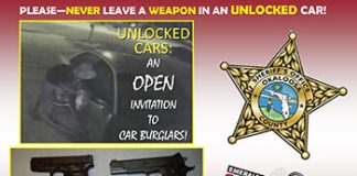 A poster with a picture of a police car and a gun.