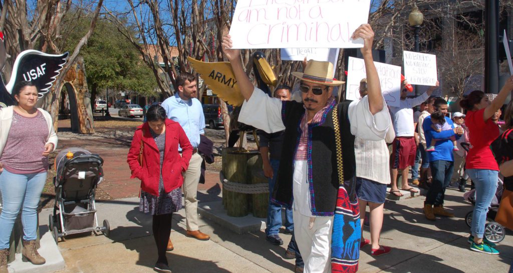 immigrants marching