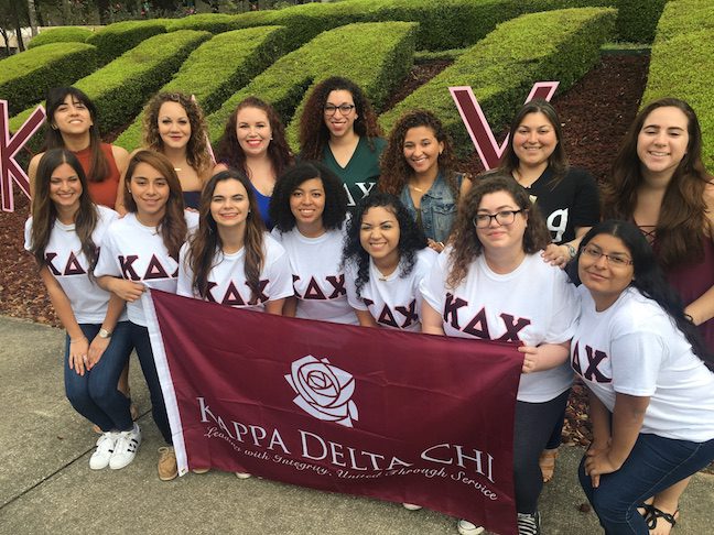 Seven founding UWF members and Kappa Delta Chi sisters who initiated them.