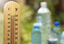 outdoor thermometer and bottles of water