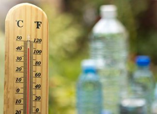 outdoor thermometer and bottles of water
