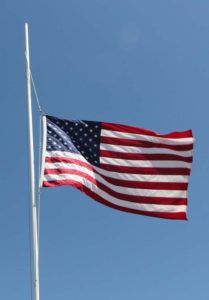 American flaga at half mast