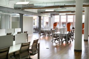 Office with chairs, tables amd windows