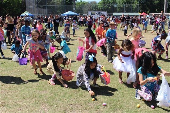 children picking up easter eggs
