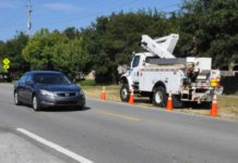 Traffic slowing for utility workers