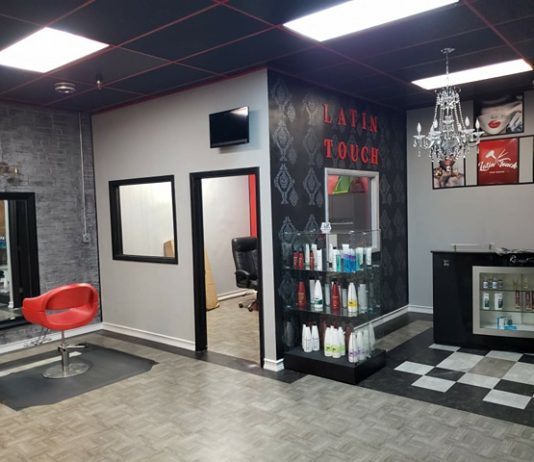 beauty salon decorated in black white and red