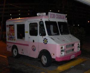 pink and wh ite ice cream truck