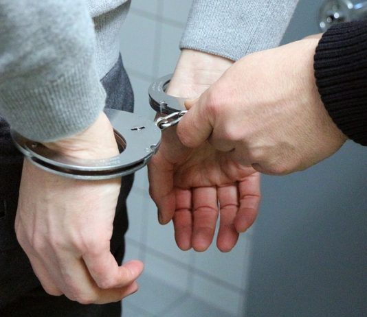 hands in handcuffs