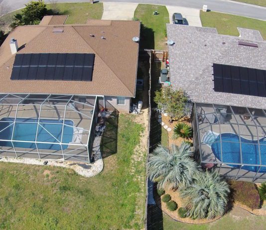 Two adjacent homes with solar panels