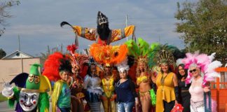 group of people in carnaval costumes