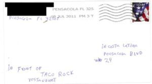 envelope addressed to "La Costa Latina in front of Taco Rock"