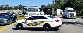 County sheriff's car blocking traffic