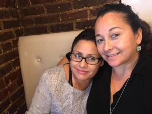 two women posing for selfie