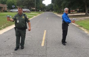 deputies on street using scanner