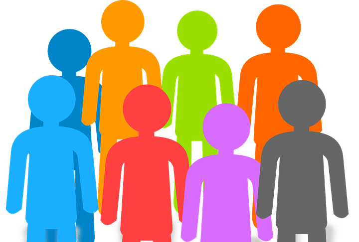 A group of people standing in front of a cloud.