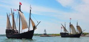 two old ship replicas on the water