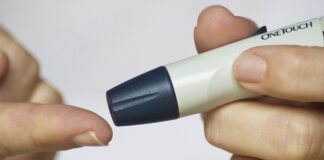 a finger being pricked for a blood sample