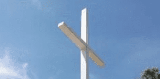 40-foot white cross in a park