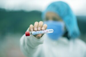 woman holding test tube