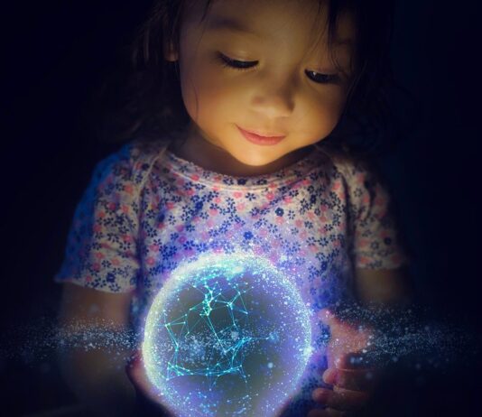 child holding globe
