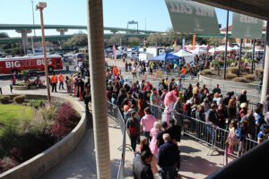 people waiting in line to enter an event