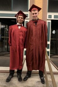 Gustavo and friend at high school graduation