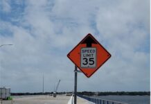 Traffic speed sign on bridge