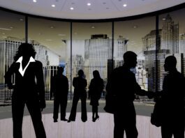Silhouettes of business people networking