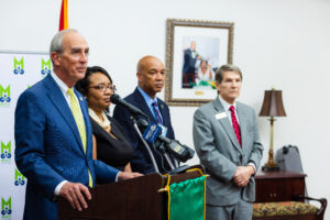 Mayor Stimpson and college representatives at press conference