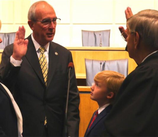 Mobile Mayor Sandy Stimpson being sworn into office