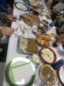 Large table at community dinner
