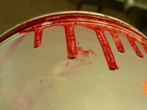 dried paint on a paint can