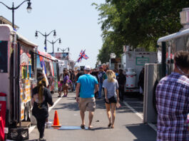 People walking through food truck event