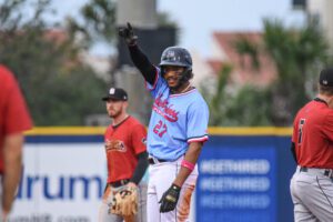 Baseball player waving