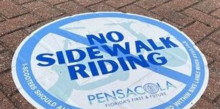 No Sidewalk Riding street sign