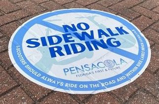 No Sidewalk Riding street sign