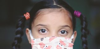 a child wearing a face mask