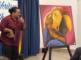 Patrick Quintanilla presenting his art