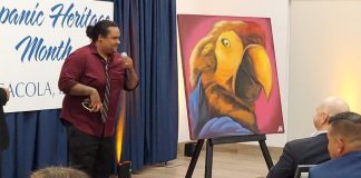 Patrick Quintanilla presenting his art
