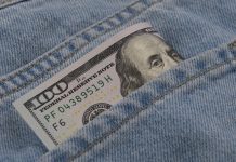 $100 bill in jeans pocket