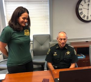 Sheriff Chip Simmons speaking to parents via computer