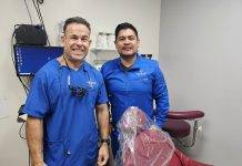 Dentists Gabriel Hernandez and assistant Ronnie Gonzales
