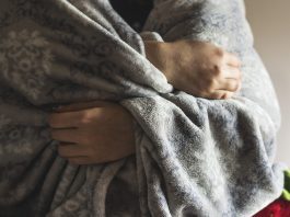 A person wrapped in a blanket
