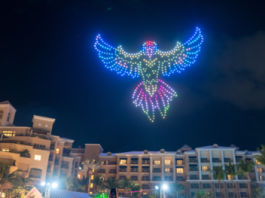 Drown light show bird formation in the sky over a hotel