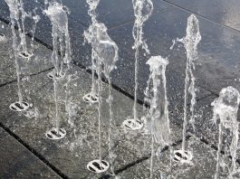 Water sprouting through concrete