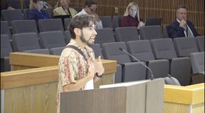 Sam A presents to the city council in defense of the Chilean workers abandoned by their visa sponsor, ST Engineering