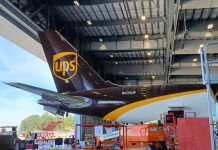 UPS brown tail inside and ST Engineering hangar