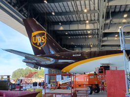 UPS brown tail inside and ST Engineering hangar