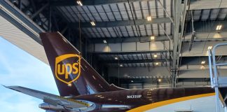 UPS brown tail inside and ST Engineering hangar