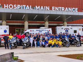 Hospital staff standing at Baptist Hospital Main Entrance